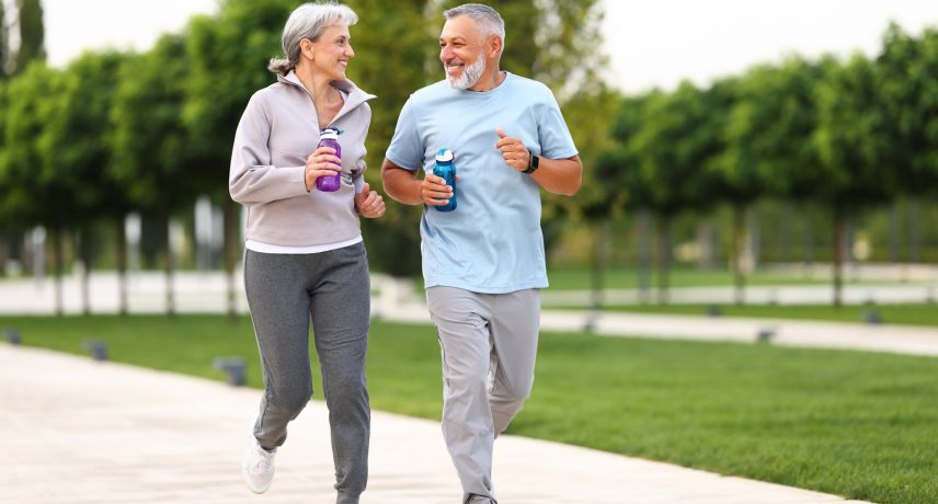 Full-length,Photo,Of,Lovely,Joyful,Retirees,Couple,Jogging,Outside,In